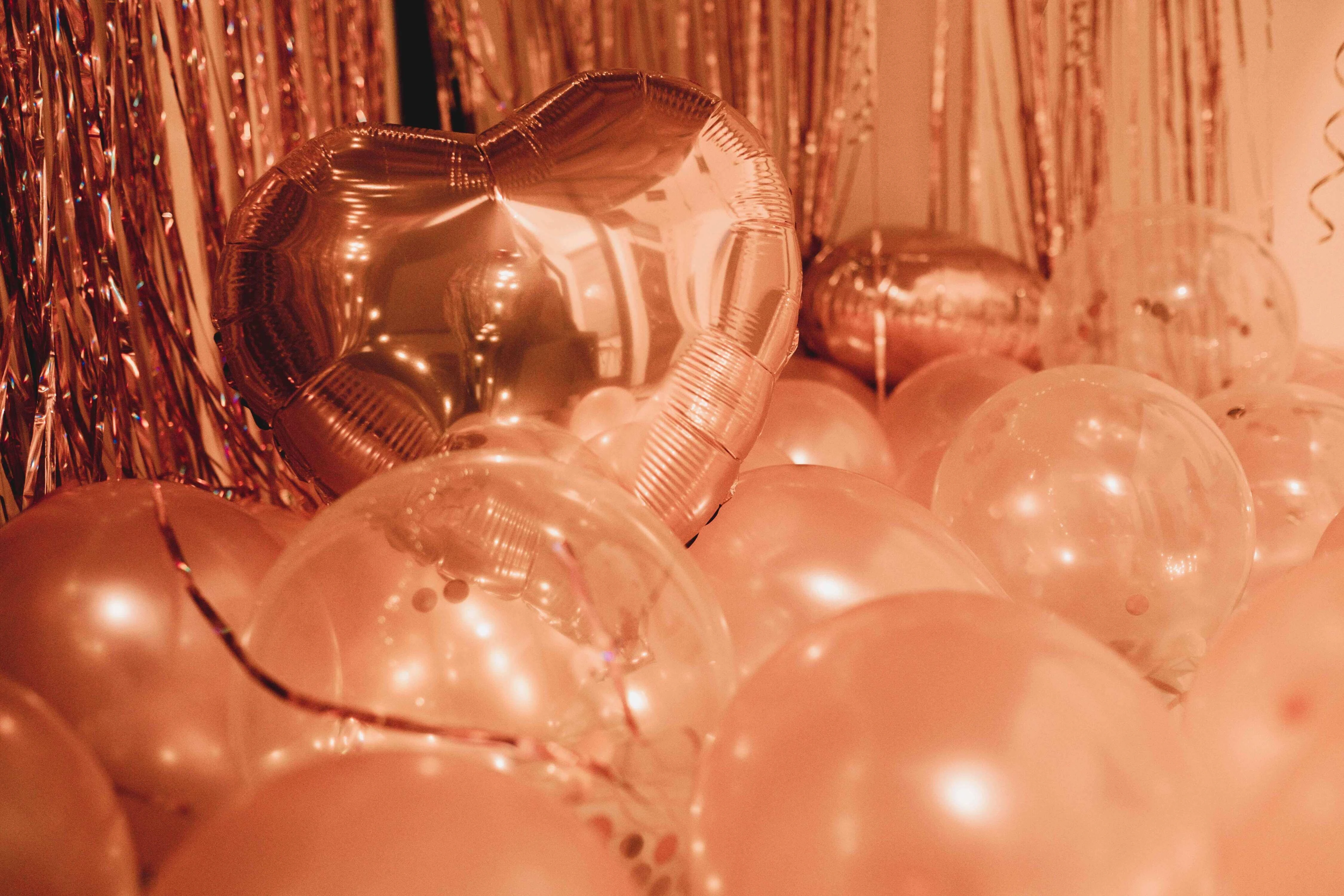 heart and spheric shaped copper color balloons